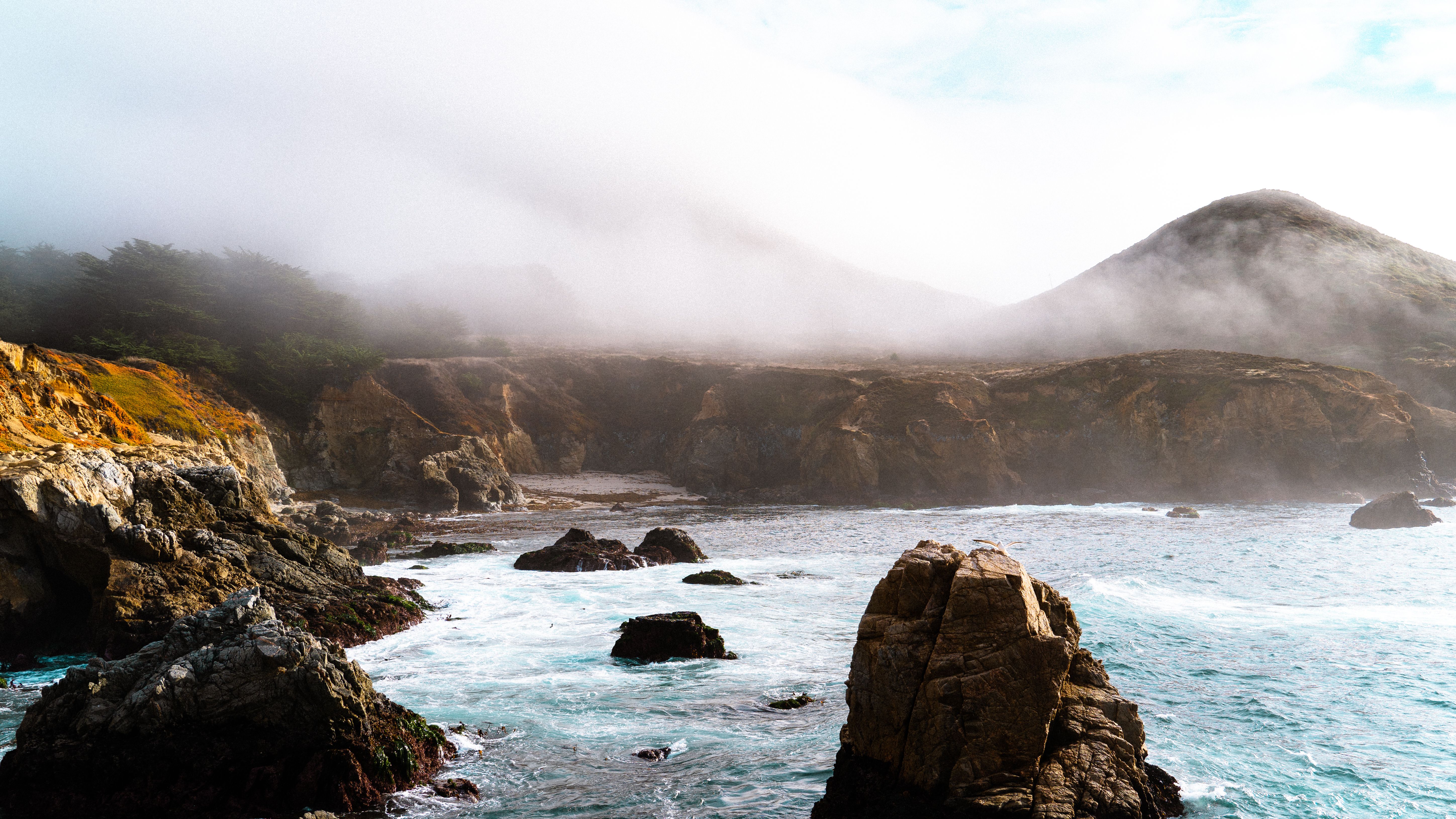 Placeholder frame — replace with a travel/landscape photograph of coastal fog.